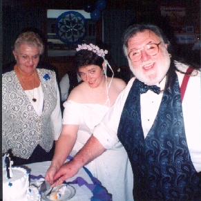 Tina cuts the cake and Nana Baker is first on line 
for a taste.  (JUST KIDDING NANA)