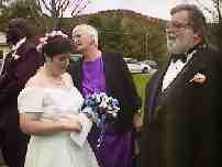 Here Sally is Picking Burdseed from NINIs hair.  We 
were the target of all our friends and family after the Wedding 
Ceremony