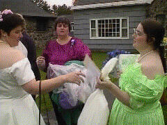 Outside the ceremony and through the Birdseed shower, 
Tina collected the Loot Bag before leaving